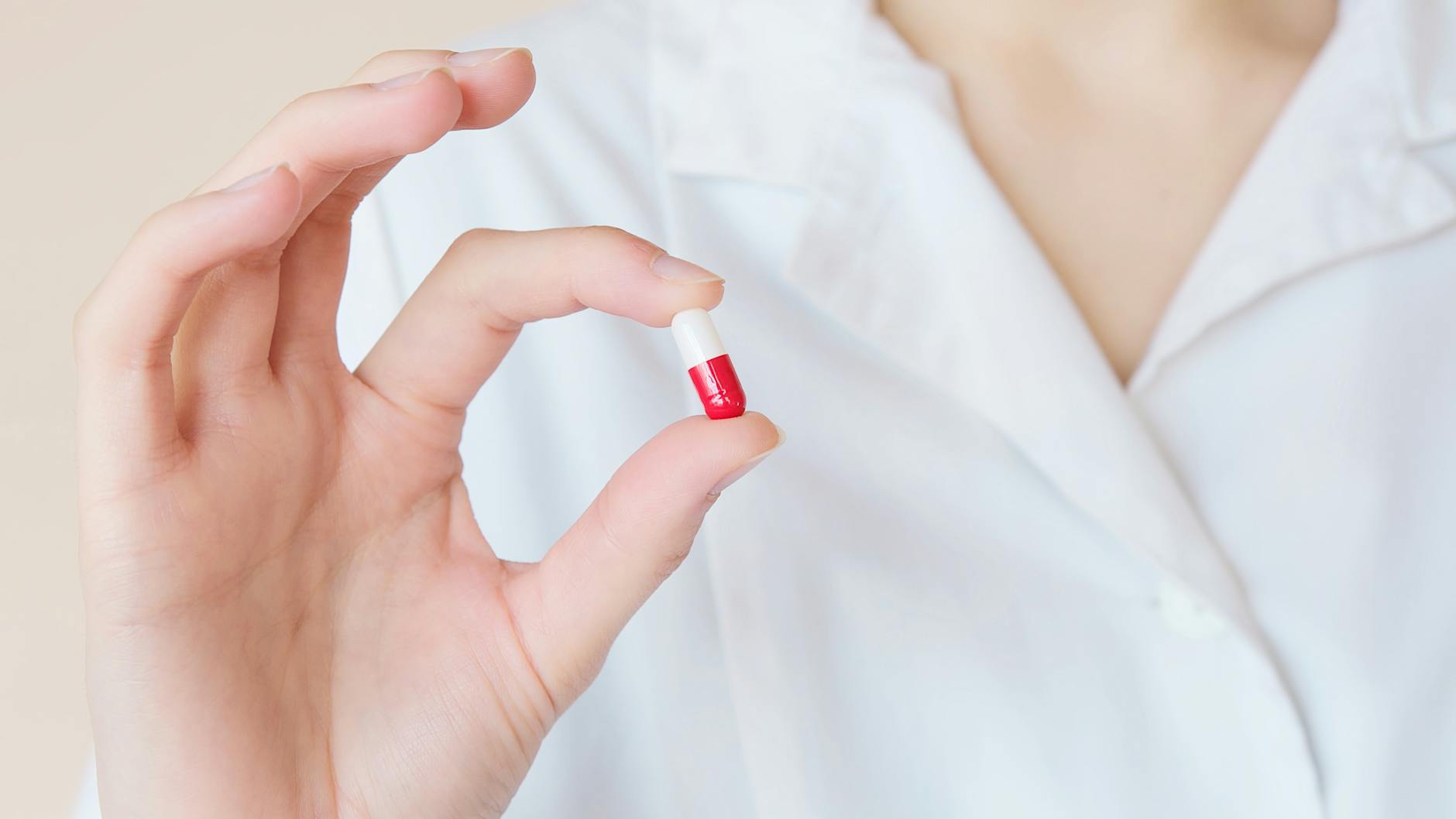 Woman with a pill | Economic Externalities Are Spoilers of Free Markets