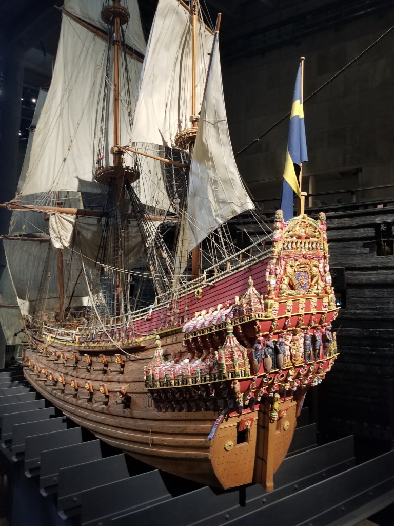 This is my photo of a model of the Vasa ship. The model is colorful and feature a Swedish (blue and yellow) flag as well as sails.