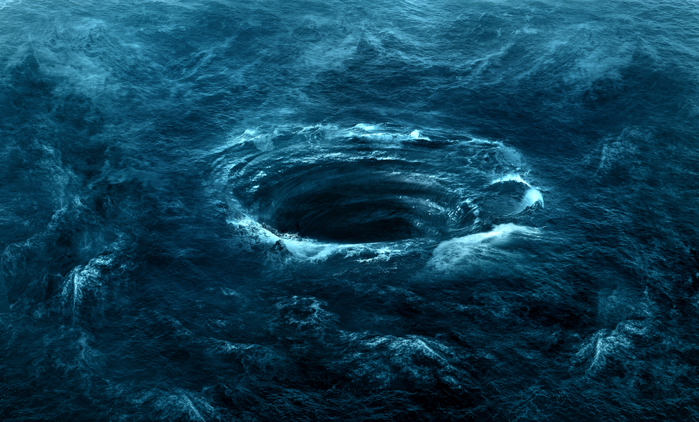 A giant deep ocean swirl in the middle of the blue ocean.