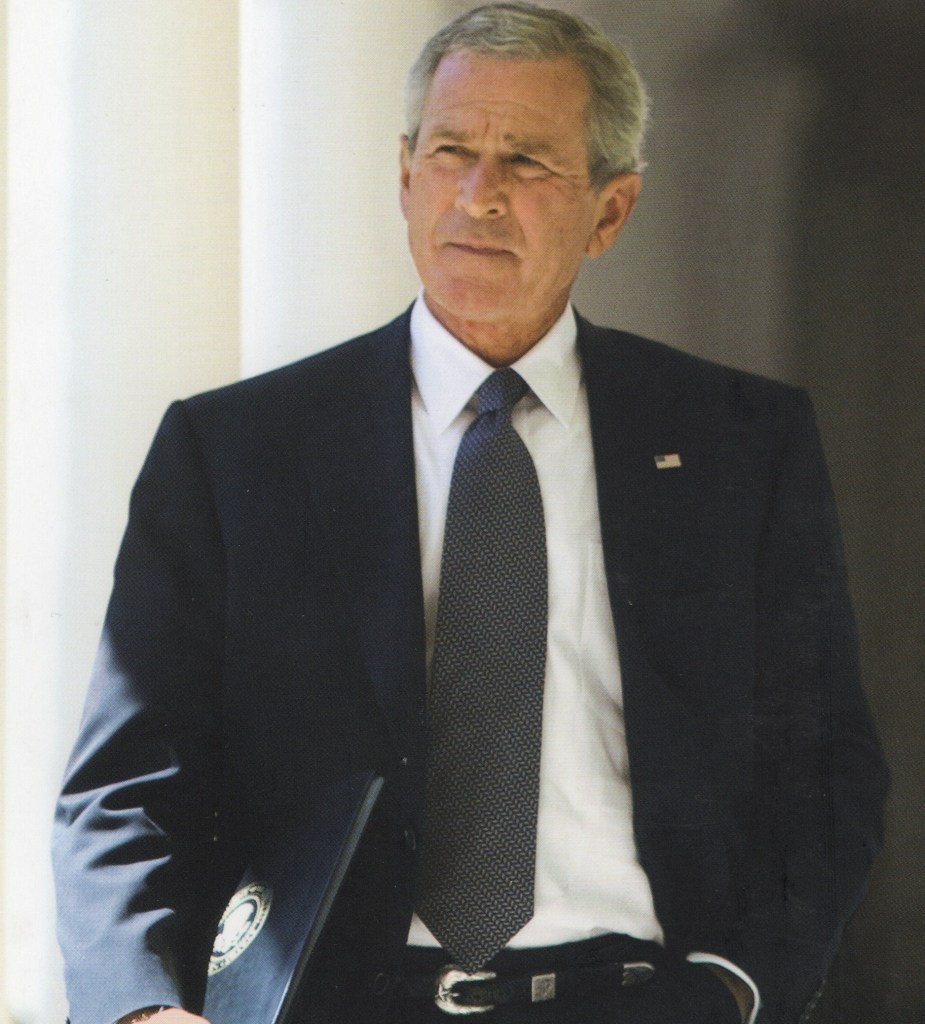 A photo from the front cover of Decision Points by George W. Bush. It shows George W. Bush wearing a black suite.