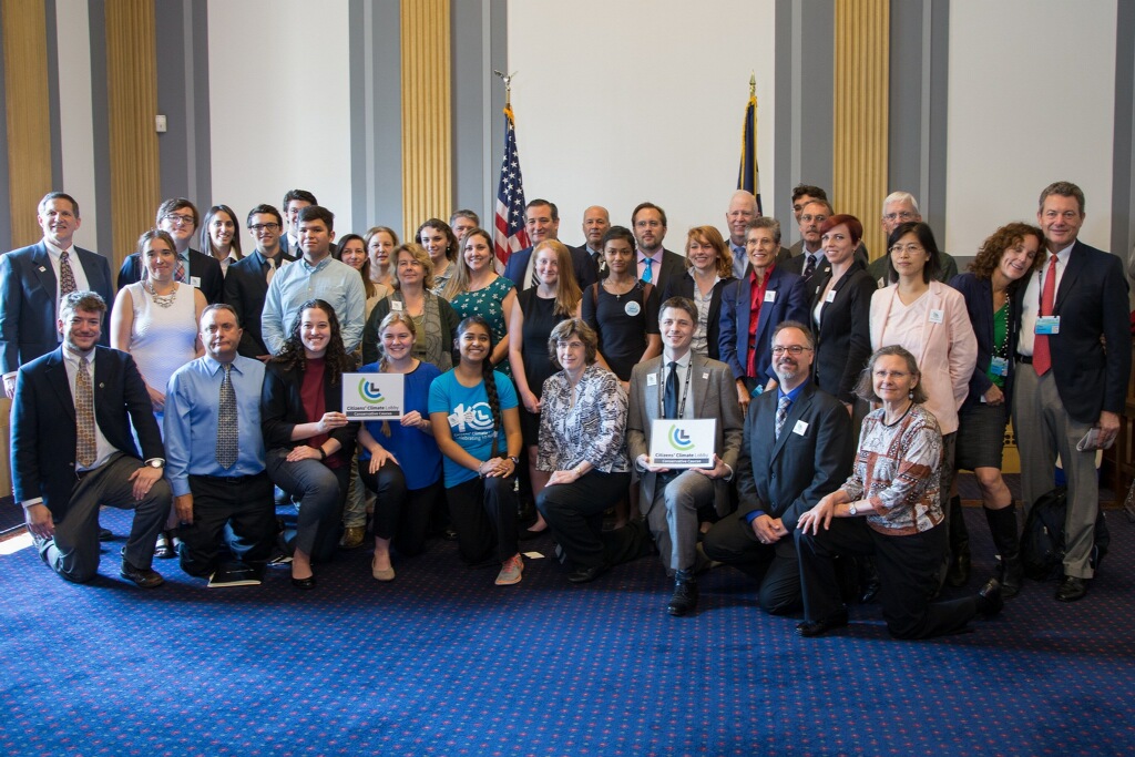 About 40 well-dressed CCL volunteers with Senator Ted Cruz.