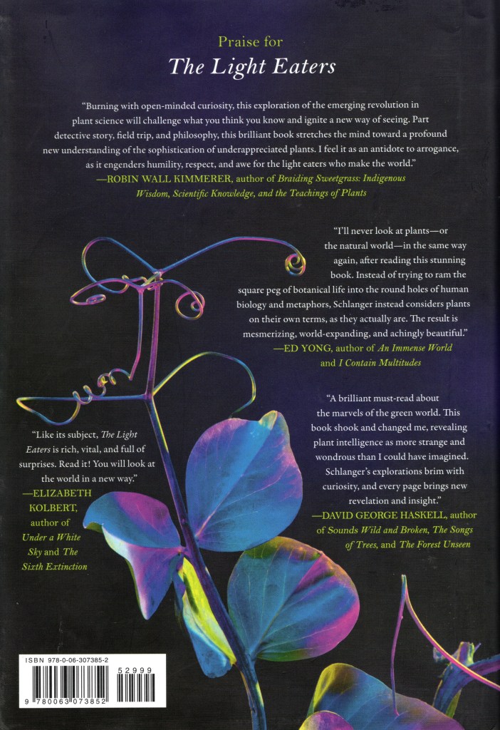 The back cover features a picture of a plant on a black background and praise for the book.