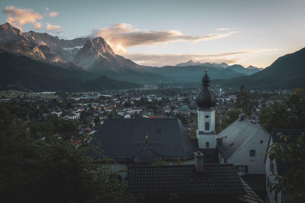 Mountains in the background. The town of Garmisch-Partenkirchen in the foreground. | Bad Travel Memories – Stream of Consciousness