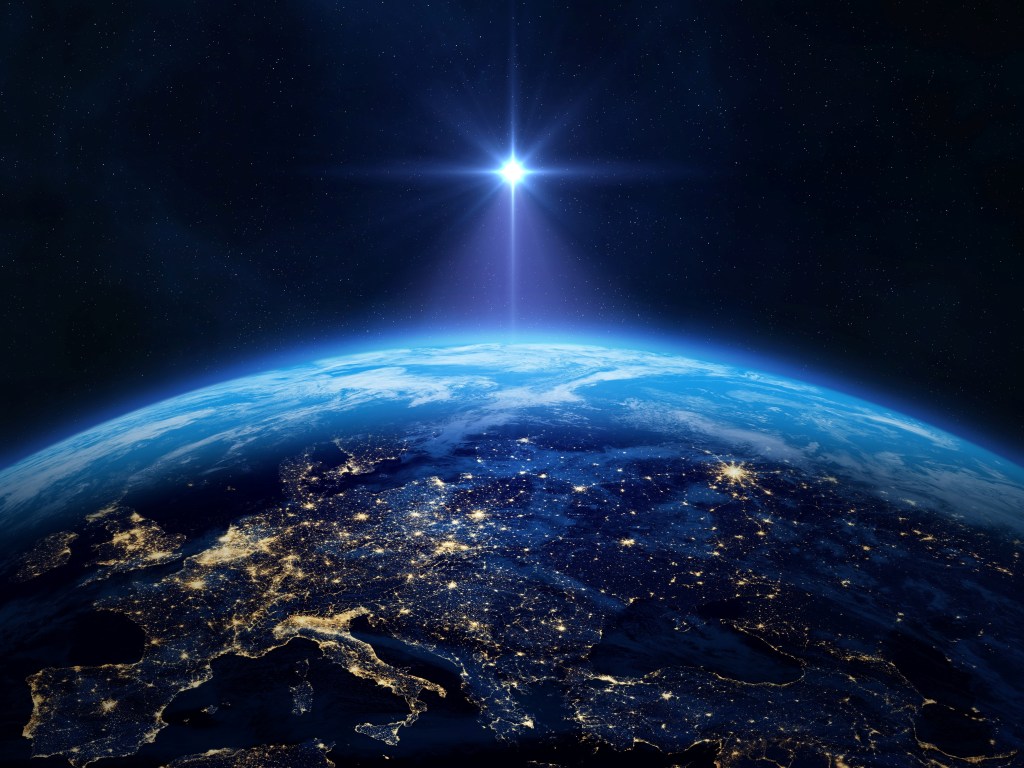 The picture shows a bright shining down on planet Earth lighting up the planet a bit. The light from the sun is intense. | The Sun is not the Cause of the current Global Warming