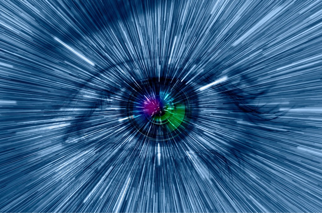 An eye with photons streaming into it.